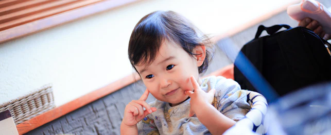 Child on Portable Hook On Chairs