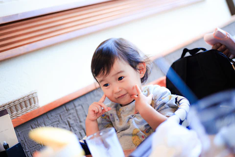 Child on Portable Hook On Chairs