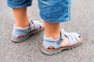 Child Wearing Leather Sandals