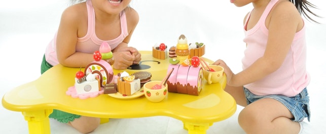 Children Playing Tea Time with Toys