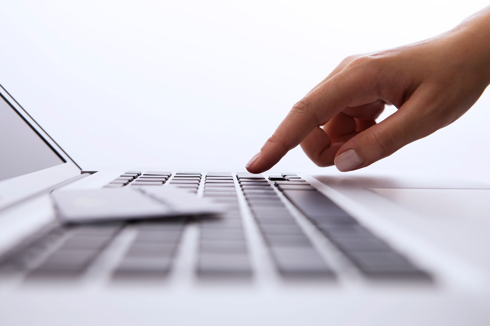 Close up of Hand on Computer Keyboard