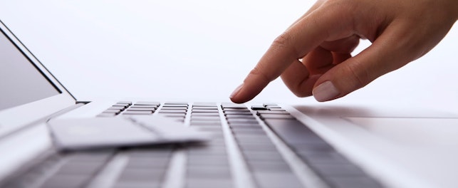 Close up of Hand on Computer Keyboard