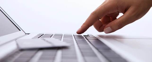 Close up of Hand on Computer Keyboard