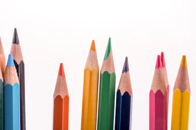 Color Pencils of Various Colors on White Background