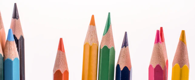 Color Pencils of Various Colors on White Background