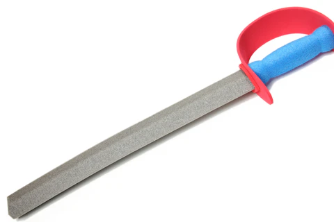 Colorful toy foam sword over white background