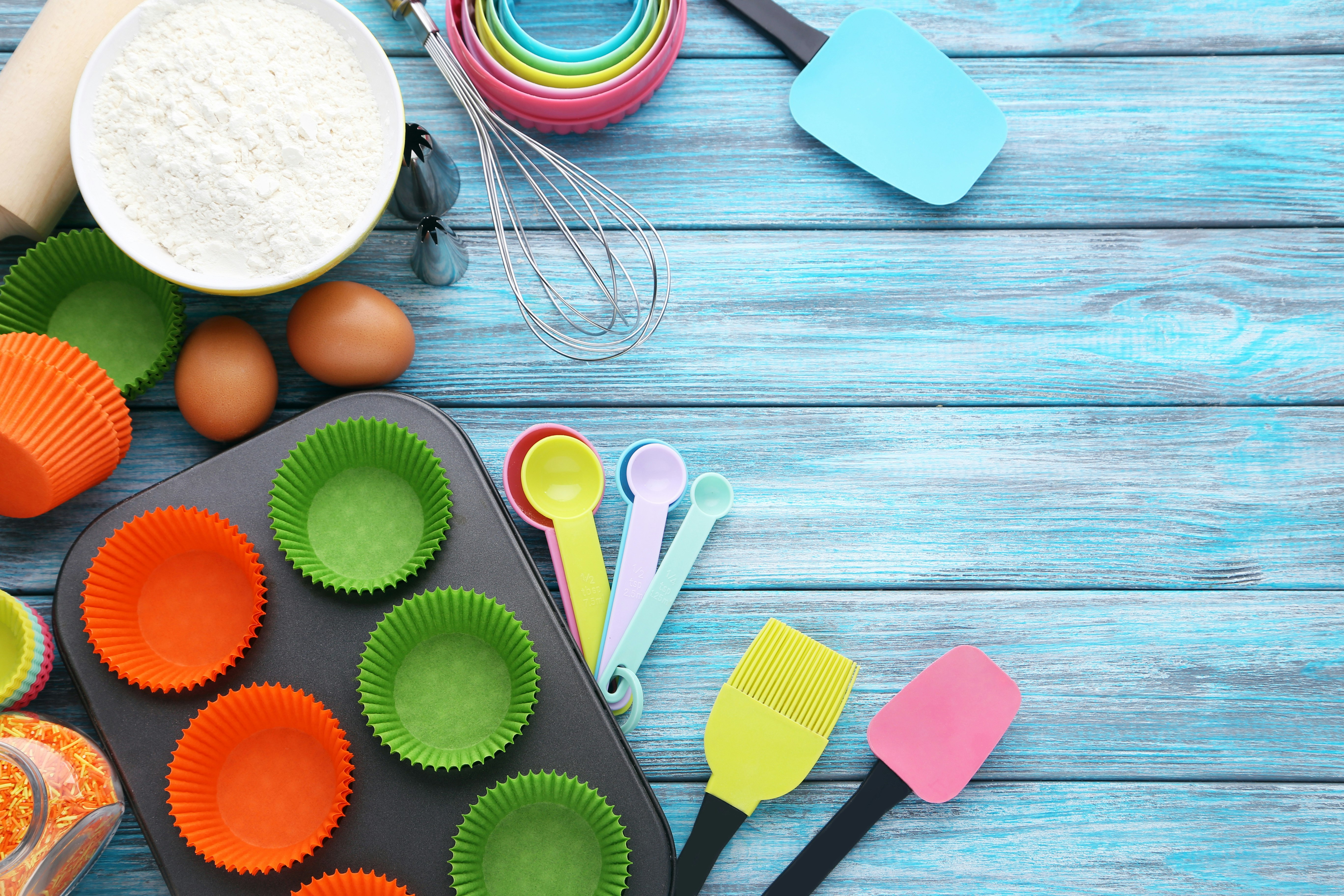 Cupcake Cases with different Kitchen Plastic Ustensils