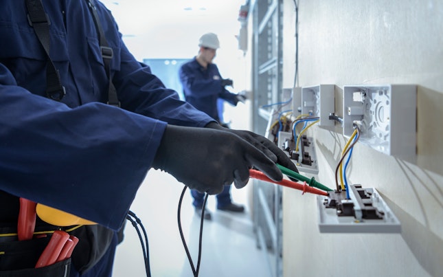 Electricians Testing Electrical Equipment