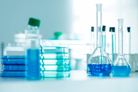 Flasks and Petri Dishes in Laboratory