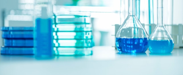 Flasks and Petri Dishes in Laboratory