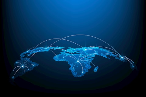 Glowing digital world map showing global connectivity with network lines linking major regions