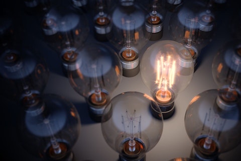 Glowing Light Bulb Between the Others