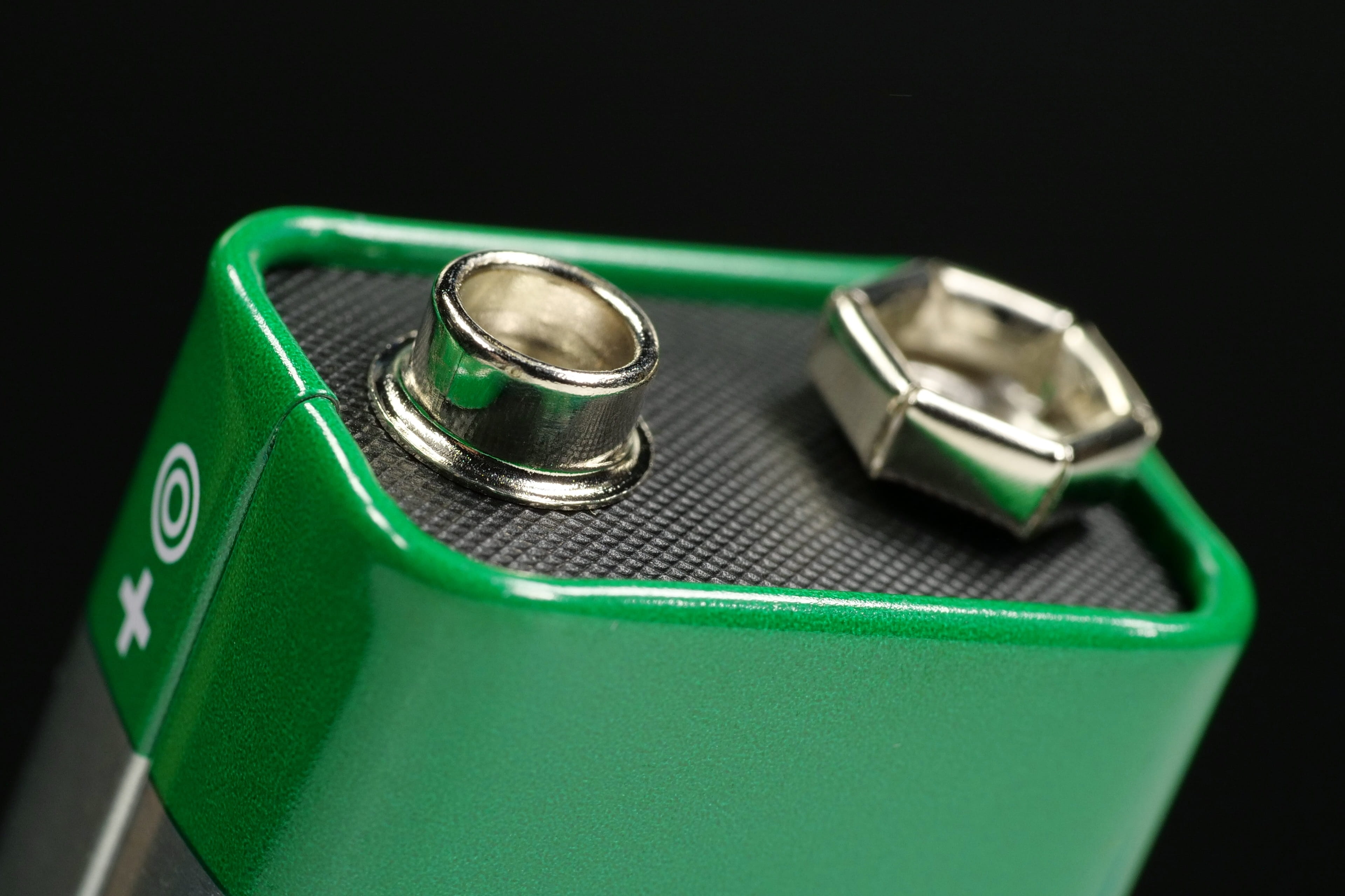 Green Nine Volt Battery with Terminals Ready to Power Devices