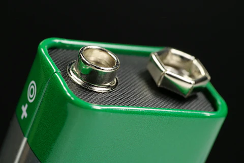 Green Nine Volt Battery with Terminals Ready to Power Devices