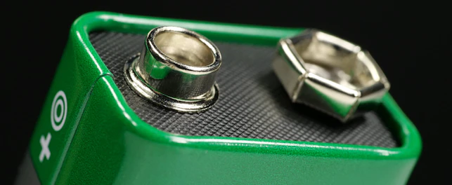 Green Nine Volt Battery with Terminals Ready to Power Devices