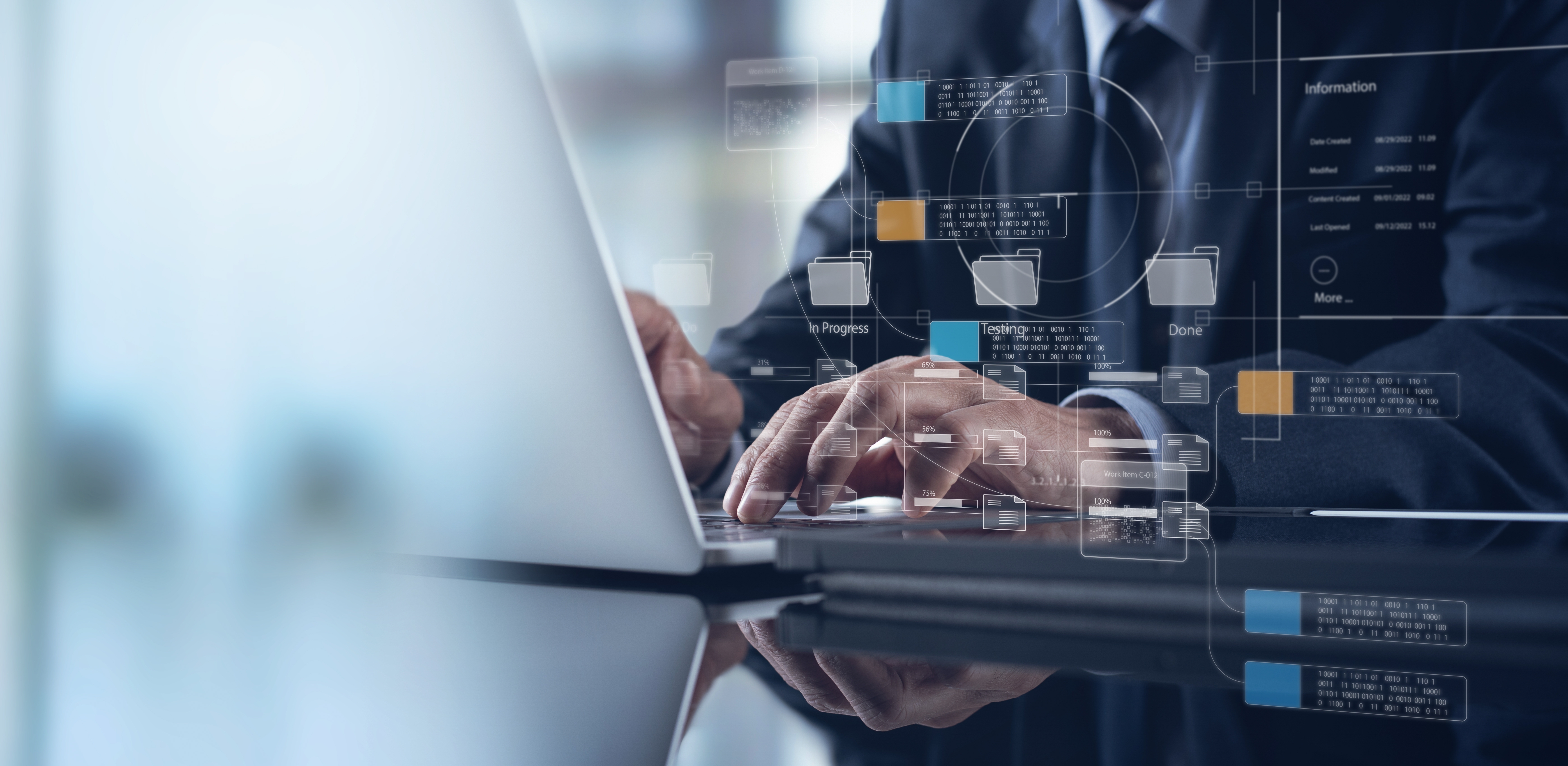 Hands typing on a laptop with transparent digital interface graphics overlaid, representing data management, information systems, or advanced digital workflows.