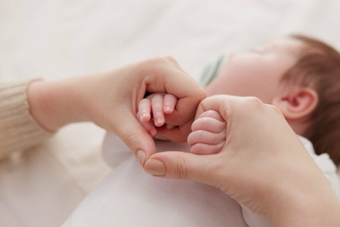Holding Hands and Mother with Baby
