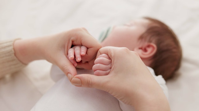 Holding Hands and Mother with Baby Holding Hands and Mother with Baby
