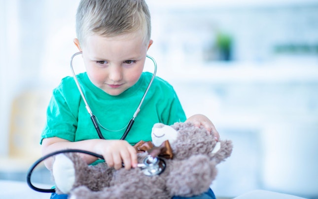 Kid Wearing Stethoscope Playing Doctor