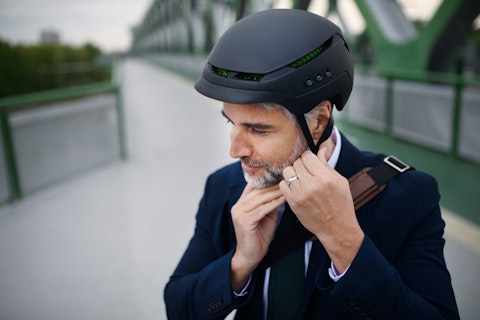 Man Fastening Helmet