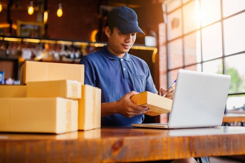 Man Preparing Delivery Boxes