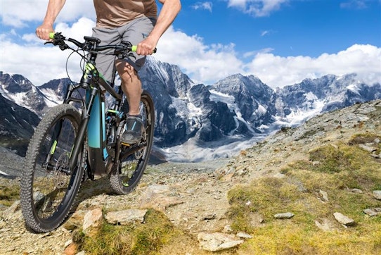Man Riding His Electric Moutain Bike