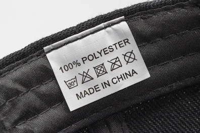 Mentioning it is made from 100 polyester