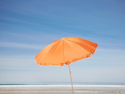 Orange Parasol on the Beach