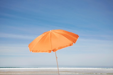 Orange Parasol on the Beach
