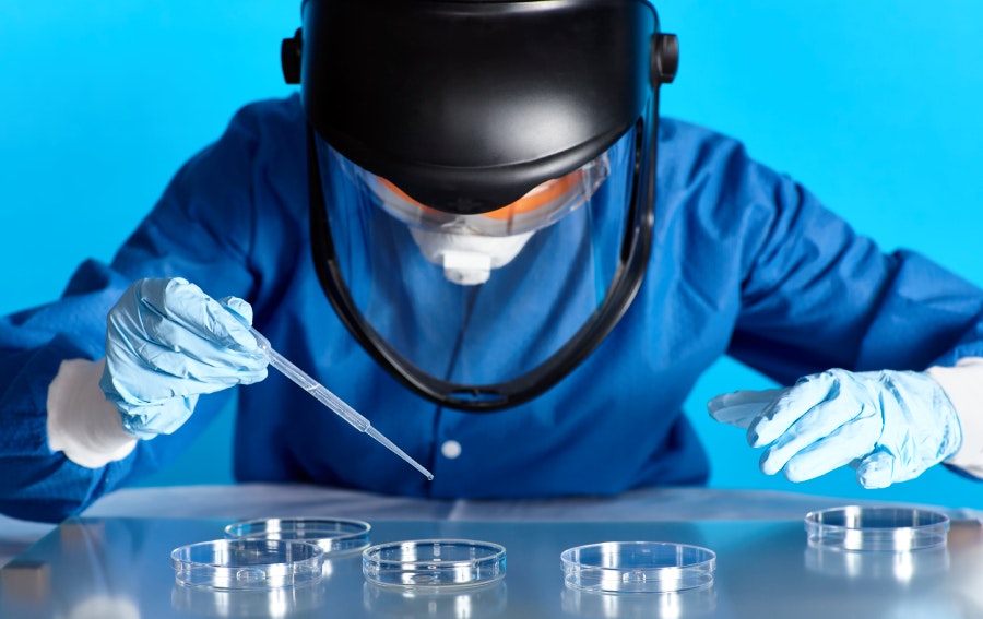 Laboratory scientist testing dangerous liquid