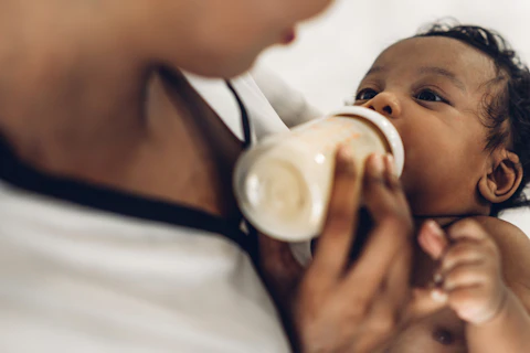 Portrait of Enjoy Happy Love Family African American Mother Playing with Adorable little Baby