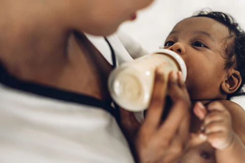 Portrait of Enjoy Happy Love Family African American Mother Playing with Adorable little Baby