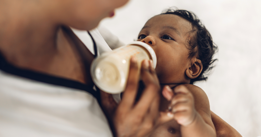 Portrait of Enjoy Happy Love Family African American Mother Playing with Adorable little Baby