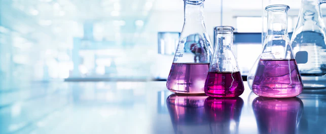 Purple Glass Flask in Blue Research Chemistry Science Banner Laboratory