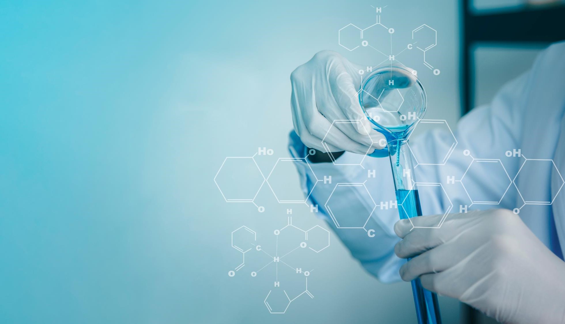 Scientist Pouring Test Tubes