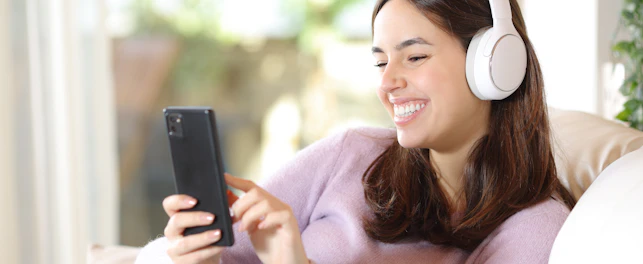 Lady Using Cellphone on Couch