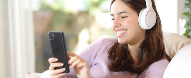 Lady Using Cellphone on Couch