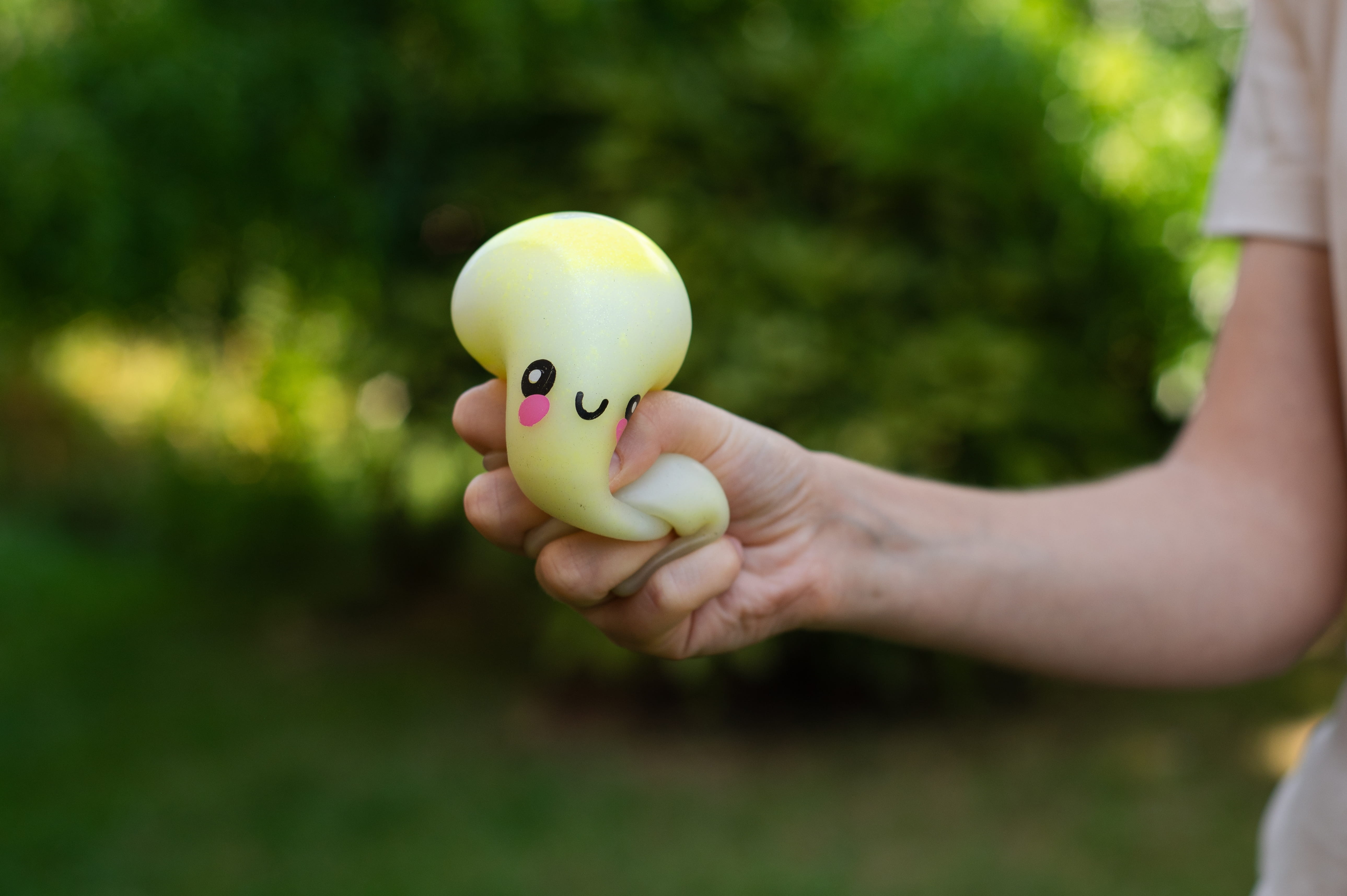 Side View of a Child Holding a Soft Sensory Dumpling Squishy