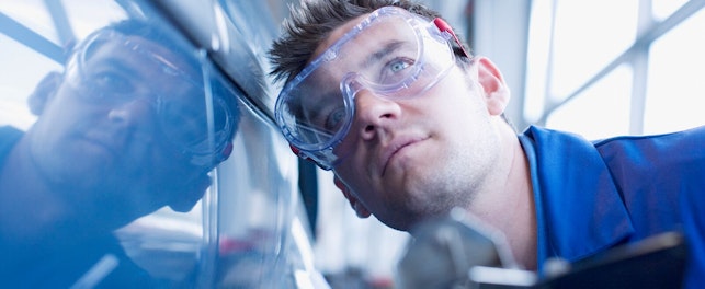 Technician Doing a Car Inspection