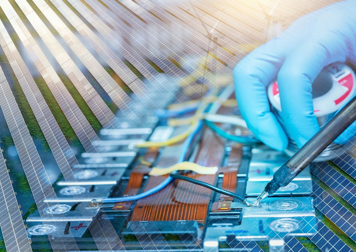 Technician Welding Wire on Rechargeable Battery