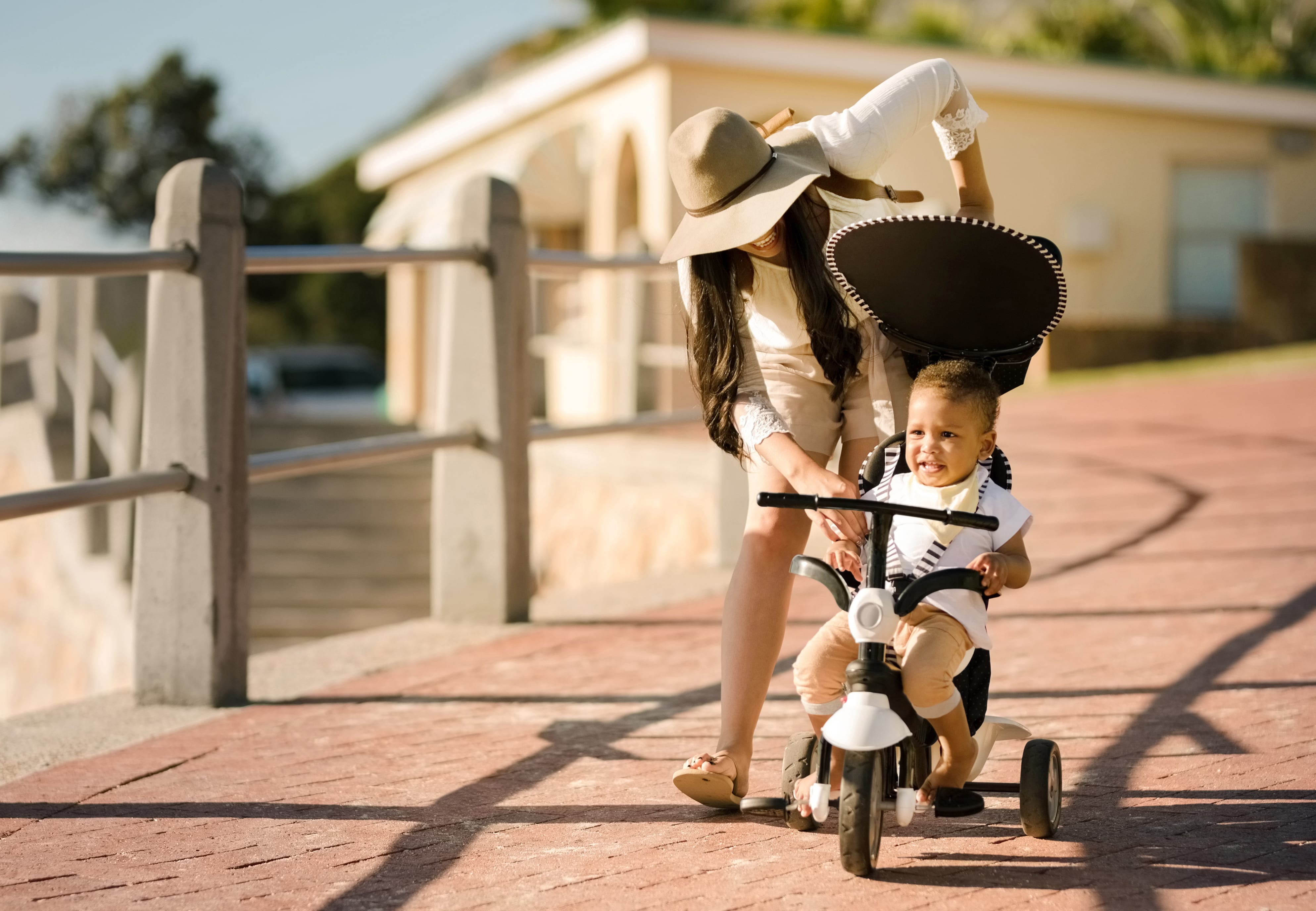 Toddler Riding a Tricycle