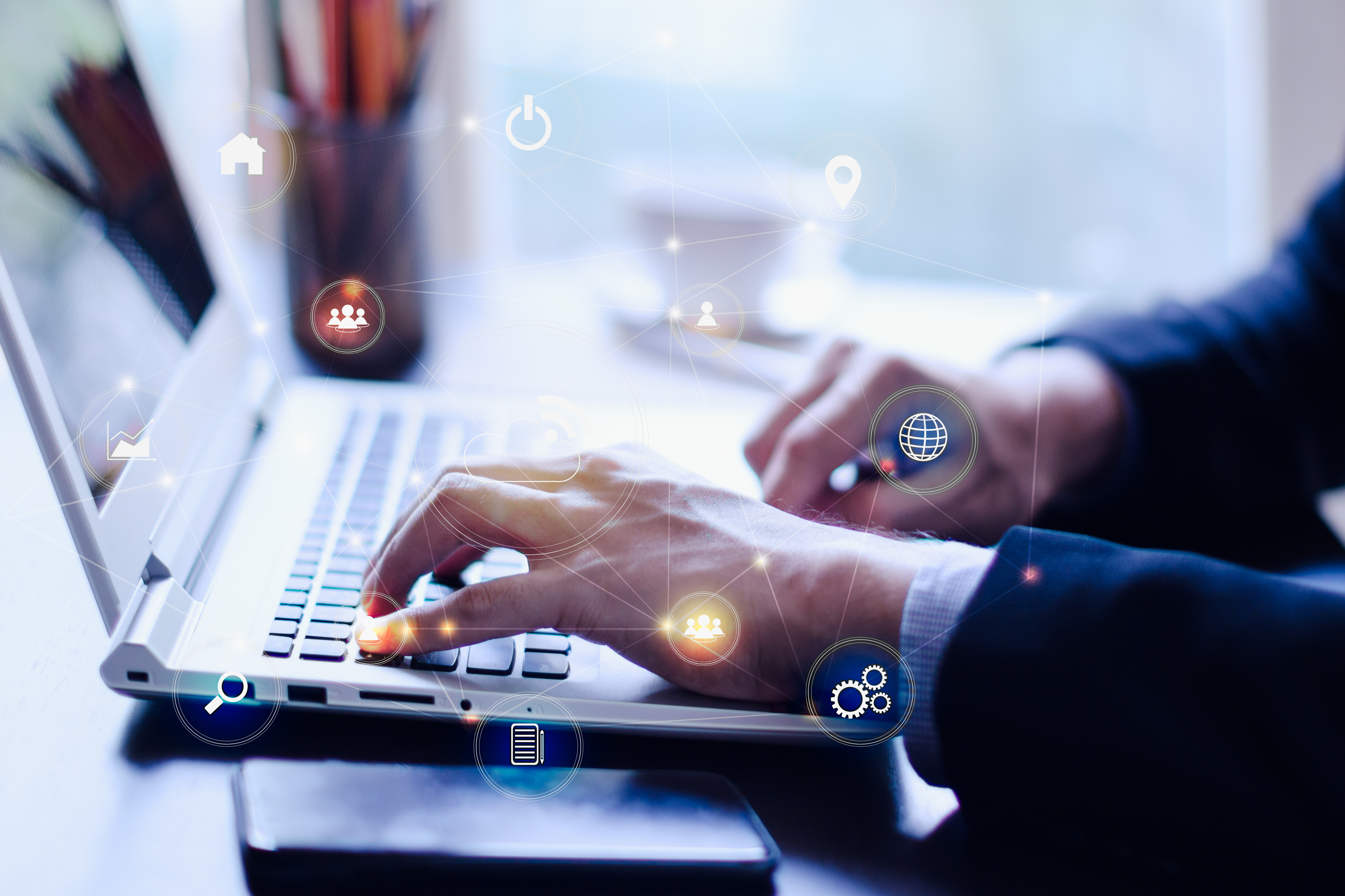 Businessman typing on his laptop with technology digital graphic