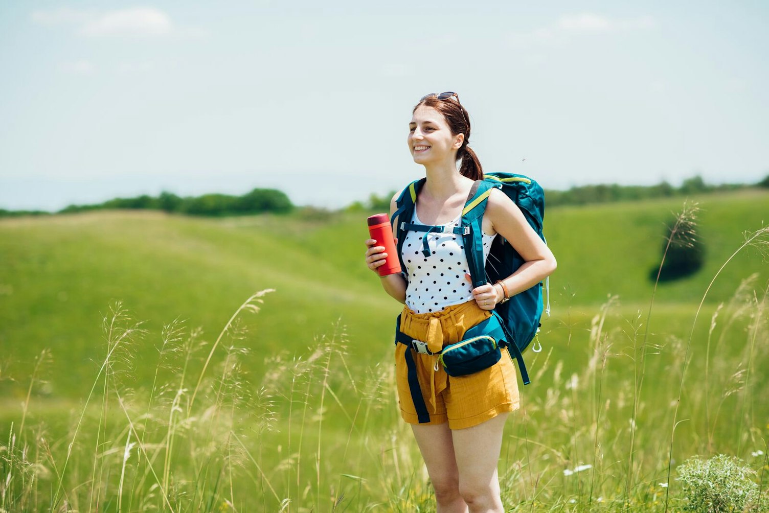 Woman Carrying Hiking Backpack