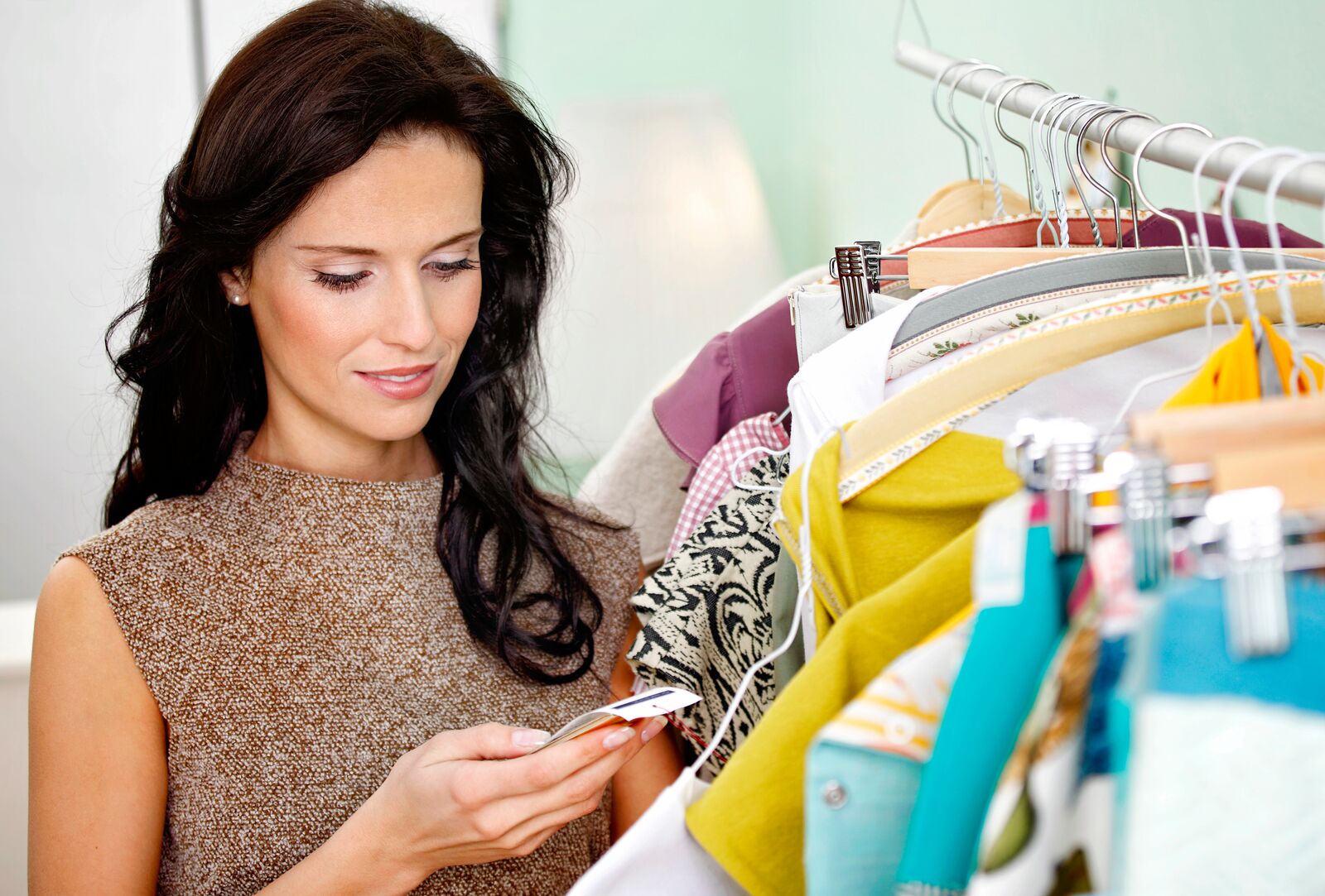 Woman Checking Label on Cloth
