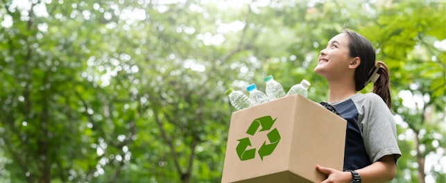 Woman Holding a Box Recycling Concept