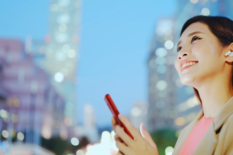 Woman outdoors using her mobile phone