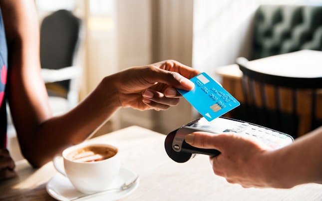 Woman Using Contactless Payment