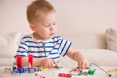 Young Boy Playing Toys