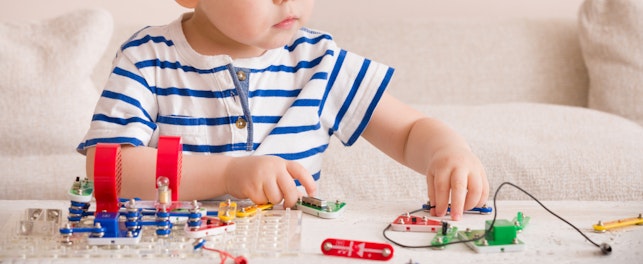 Young Boy Playing Toys