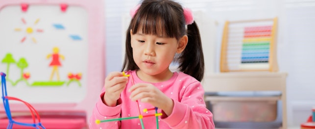 Young Girl was Playing Creative Toys at Home